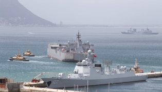 A general view of Chinese and Iranian navy ships docked at Simon's Town Harbour near Cape Town, on January 8, 2026 (Photo by RODGER BOSCH / AFP)