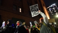People march in protest against ICE after the fatal shooting of Renee Nicole Good in downtown Minneapolis, Minnesota on January 9, 2026. A US Immigration and Customs Enforcement (ICE) agent shot and killed 37-year-old Renee Nicole Good on the streets of Minneapolis on January 7, leading to huge protests and outrage from local leaders (Photo by Octavio Jones / AFP)