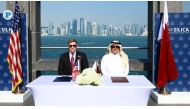Minister of State for Foreign Trade Affairs H E Dr. Ahmed bin Mohammed Al-Sayed, and the US Under Secretary of State for Economic Affairs H E Jacob Helberg during the signing ceremony yesterday.  Pic: Rajan Vadakkemuriyil/The Peninsula