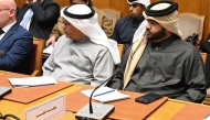  Qatari officials attending the meeting.