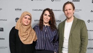 (L-R)  Isra'a, Itab Azzam and Jack MacInnes attend the 