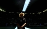 A security officer looks on as the roof of Rod Laver Arena is closed due to extreme heat during the men's singles match between Italy's Jannik Sinner and USA's Eliot Spizzirri in Melbourne on January 24, 2026. (Photo by David Gray / AFP) 