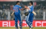 India's Abhishek Sharma and captain Suryakumar Yadav celebrate their team's win at the end of the third Twenty20 between India and New Zealand at Guwahati on January 25, 2026. (Photo by Biju BORO / AFP) 