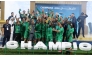 Al Ahli players and officials celebrate their victory.