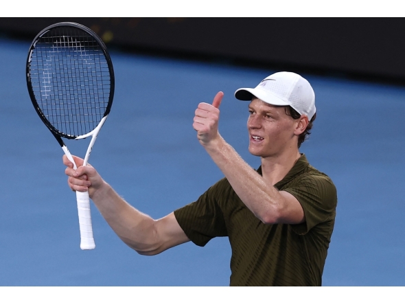 Italy's Jannik Sinner celebrates beating Italy's Luciano Darderi in their men's singles match on day nine of the Australian Open tennis tournament in Melbourne on January 26, 2026. (Photo by Izhar Khan / AFP)
