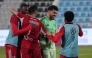 Al Arabi players celebrate their win over Qatar SC. 