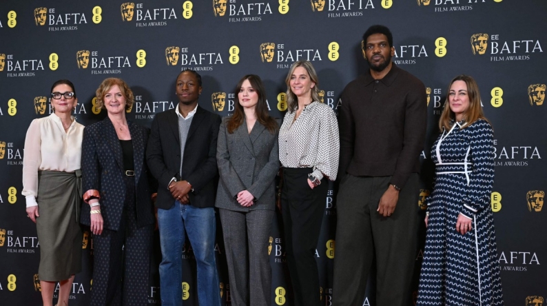 (L-R) BAFTA CEO Jane Millichip, Chair of BAFTA, Sara Putt, British actor David Jonsson, British actor Aimee Lou Wood, Chair of the Film Committee, Emily Stillman, Deputy Chair of the Film Committee, Anthony Andrews and Executive Director of Awards and Content, Emma Baehr pose for a picture at the announcement of the British Academy Film Awards (BAFTA) nominations in central London on January 27, 2026. (Photo by JUSTIN TALLIS / AFP)
