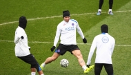 PSG’s Illia Zabarnyi (centre) controls the ball during a training session at the Campus Paris Saint-Germain in Poissy, yesterday. 
