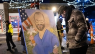 Mourners visit a memorial to Alex Pretti on January 27, 2026 in Minneapolis, Minnesota. Photo by SCOTT OLSON / GETTY IMAGES NORTH AMERICA / Getty Images via AFP