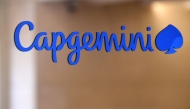 This photograph shows a logo of French IT company Capgemini at the Capgemini headquarters in Paris on June 25, 2019. (Photo by Eric Piermont / AFP)