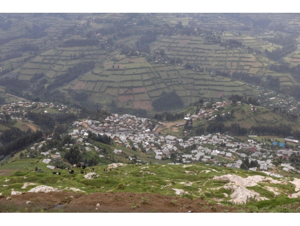 (FILES) A general view of the mine pits and the town in Rubaya on March 5, 2025.  (Photo by Camille Laffont / AFP)
