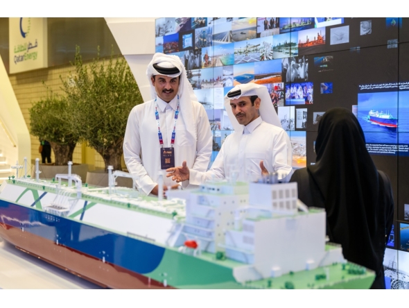 Amir H H Sheikh Tamim bin Hamad Al Thani being briefed by Minister of State for Energy Affairs, President and CEO of QatarEnergy H E Saad Sherida Al-Kaabi during the LNG2026 conference, yesterday.