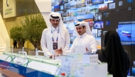 Amir H H Sheikh Tamim bin Hamad Al Thani being briefed by Minister of State for Energy Affairs, President and CEO of QatarEnergy H E Saad Sherida Al-Kaabi during the LNG2026 conference, yesterday.