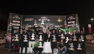 QRC Director General Sheikh Jabor bin Khalid Al Thani with the podium winners of Arabian Drag Racing League Round 4. 
