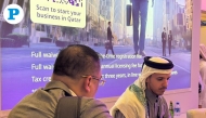 Qatar Financial Centre representative Abdullah Alsuliti (R). All photos by Mahmoud Elmazaty/The Peninsula.
