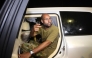Seif al-Islam Kadhafi appears in front of supporters and journalists at his father's residential complex in the Libyan capital Tripoli in the early hours of August 23, 2011.