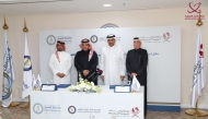 Minister of Transport H E Sheikh Mohammed bin Abdullah bin Mohammed Al-Thani (second right) and other officials at the MoU signing ceremony. 
