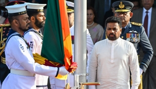 Sri Lanka's President Anura Kumara Dissanayake (front, R) arrives to hoist the national flag during the country's 78th Independence Day celebrations at Independence Square in Colombo on February 4, 2026. (Photo by Ishara S. KODIKARA / AFP)