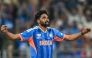 India's Mohammed Siraj reacts after taking the wicket of USA's Saiteja Mukkamalla during the 2026 ICC Men's T20 Cricket World Cup group stage match between India and USA at the Wankhede Stadium in Mumbai on February 7, 2026. (Photo by Punit Paranjpe / AFP)
 
