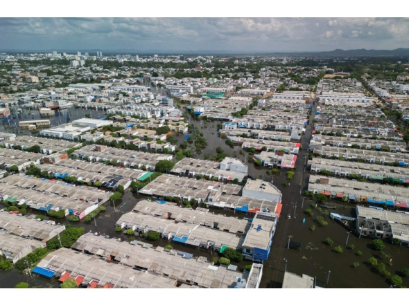 Aerial view of flooded streets in Monteria, Colombia taken on February 9, 2026. (Photo by AFP)