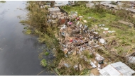 An aerial view of the city of Toamasina, on the east coast of Madagascar, struck by Tropical Cyclone Gezani on February 11, 2026. (Photo by Tsiky Sikonina / AFP)