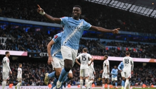 Manchester City's English defender #15 Marc Guehi celebrates after scoring a goal during the English FA Cup third round football match between Manchester City and Salford City at the Etihad Stadium in Manchester, north west England, on February 14, 2026. (Photo by Oli SCARFF / AFP)