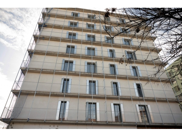 A building designated for affordable social rental housing is pictured on February 13, 2025 in Sant Boi de Llobregat. Photo by Josep LAGO / AFP