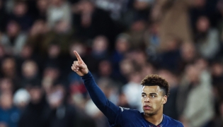 Paris Saint-Germain's French midfielder #14 Desire Doue celebrates scoring his team's third goal during the UEFA Champions League knockout round play-off first leg football match between AS Monaco and Paris Saint-Germain at the Stade Louis II in the Principality of Monaco on February 17, 2026. (Photo by Valery HACHE / AFP)