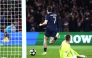 Paris Saint-Germain's Georgian forward #07 Khvicha Kvaratskhelia (L) celebrates after scoring Paris Saint-Germain's second goal during the UEFA Champions League play-off second leg football match between Paris Saint-Germain (PSG) and AS Monaco at the Parc des Princes stadium in Paris on February 25, 2026. (Photo by FRANCK FIFE / AFP)