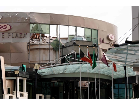 The damaged Crown Plaza hotel, following an Iranian military strike, in Manama on March 1, 2026. (Photo by Fadhel Madan / AFP)