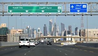 Vehicles drive along the highway leading to and from Kuwait City on March 2, 2026. Photo by YASSER AL-ZAYYAT / AFP