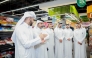 Minister of Commerce and Industry H E Sheikh Faisal bin Thani bin Faisal Al-Thani along with other officials during a visit at a retail outlet.