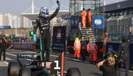Mercedes' George Russell of Britain celebrates after the Sprint Qualifying of Formula One Chinese Grand Prix at Shanghai International Circuit in Shanghai, China (Photo by Qian Jun/Xinhua) 

