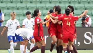 China players (R) celebrate a goal by teammate Shao Ziqin during the AFC Women's Asian Cup Australia 2026 football match between China and Taiwan in Perth. (Photo by Antony Dickson/ AFP) 