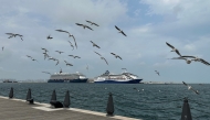 A photograph shows cruise ships moored in the old port of Doha on March 10, 2026. Photo by AFP
