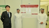 From left:  Students Junseo Yoon, Jassim Al Hail, and Taleb Dahman during the poster presentation event.