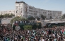 (Files) Supporters cheer as the Senegalese football players ride on a bus during a trophy parade in the streets of Dakar on January 20, 2026. (Photo by Guy Peterson / AFP)