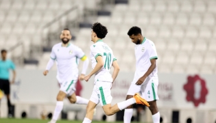 Al Ahli's Younis Abdelrahman (centre) celebrates after scoring a goal against Al Gharafa yesterday.