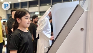 File photo of a child at Eidiya ATM 