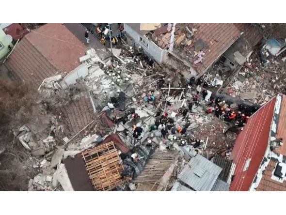 Screengrab of the wreckage of the collapsed buildings as viewed from the air ( NTV)