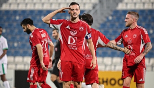 Al Arabi's Pablo Sarabia (centre) celebrates after scoring a goal.