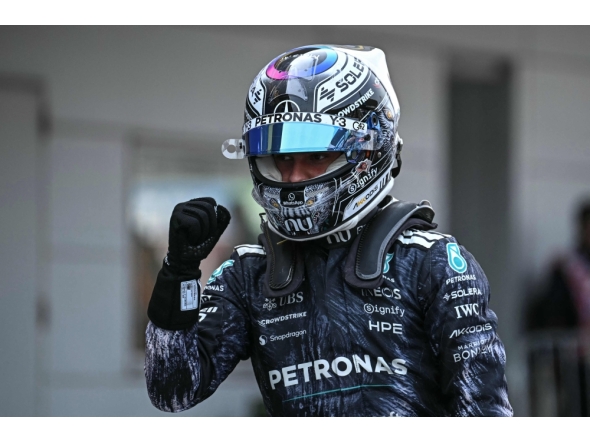 Mercedes' Italian driver Kimi Antonelli reacts after the qualifying session ahead of the Formula One Japanese Grand Prix at the Suzuka circuit in Suzuka, Mie prefecture on March 28, 2026. (Photo by Philip Fong / AFP)