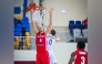 Al Arabi's Elmedin Kikanovic (left) shoots to score.