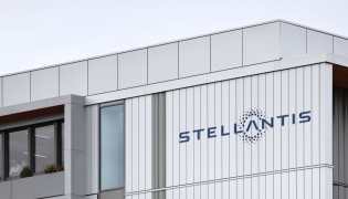 This photograph shows Stellantis' logo displayed on the premises of the multinational car manufacturer's plant in Poissy, west of Paris, on September 23, 2025. Photo by Thibaud MORITZ / AFP