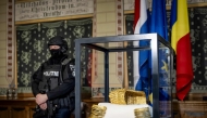 The recovered golden helmet of Cotofenesti and two gold bracelets that were stolen from the Drents Museum are displayed in a glass box in Assen on April 2, 2026. (Photo by Sem van der Wal / ANP / AFP) 