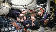 This screen grab from NASA's feed released on April 3, 2026, shows the four Artemis II crew members (L-R) Canadian Space Agency (CSA) astronaut Jeremy Hansen, Artemis II mission specialist, NASA astronauts Reid Wiseman, Artemis II commander, Christina Koch, Artemis II mission specialist and Victor Glover, Artemis II pilot. (Photo by Handout / NASA TV / AFP)
