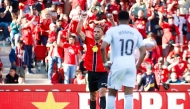 Real Mallorca's Kosovo forward #07 Vedat Muriqi celebrates scoring his team's second goal during the Spanish league football match between RCD Mallorca and Real Madrid CF at Mallorca Son Moix Stadium in Palma de Mallorca on April 4, 2026. (Photo by JAIME REINA / AFP)