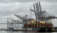An MSC operated container ship is docked in a harbour basin in Europe's second-largest port of Antwerp, northern Belgium, where shipping is largely halted following an oil spill at one of its docks, on April 10, 2026. Photo by NICOLAS TUCAT / AFP