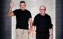 Italian stylists Domenico Dolce (R) and Stefano Gabbana (L) salute the audience at the end of the Dolce & Gabbana women's ready-to-wear Fall/Winter 2026 collection show as part of the Milan Fashion Week, in Milan on February 28, 2026. Photo by Miguel MEDINA / AFP
