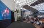 People watch a live broadcast of the return of the Artemis II crew members to Earth at the San Diego Air and Space Museum on April 10, 2026. (Photo by Apu Gomes / AFP)
